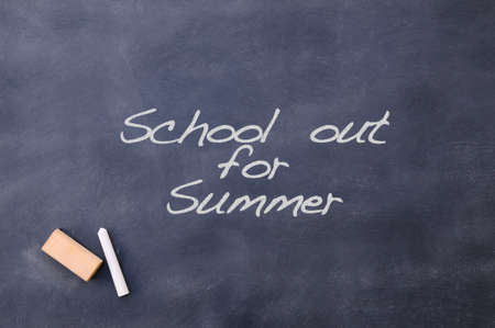Blackboard  with the phrase School out for summer.の写真素材