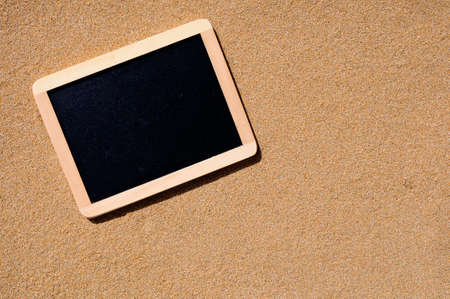 A lonely blackboard sand beach to leave a messageの写真素材