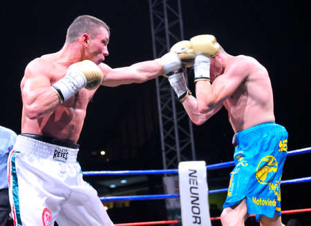 OVIEDO SPAIN  MAY 16: Aitor Nieto of Spain beat Estonian Pavel Mamontov by decision to win the European IBF and USBA welterweight championship in May 16 2015 in Oviedo Spain. Aitor Nieto L tries to beat the Estonian Pavel Mamontov R.のeditorial素材