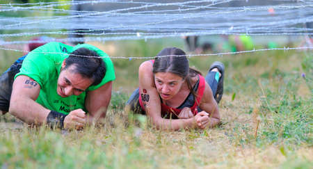 LEON, SPAIN - JUNE 6: Farinato Race, extreme obstacle race in June 6, 2015 in Leon, Spain. People...