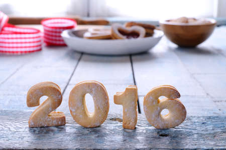 2016 homemade cookies on wooden table in the kitchenの写真素材