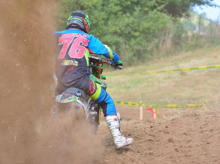 SARIEGO, SPAIN - AUGUST 17: Legendary Sariego motocross test in August 17, 2015 in Sariego, Spain. Francisco Utrilla rider with the number 76のeditorial素材