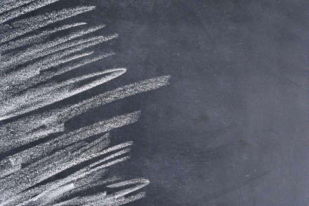 Dirty blackboard with chalk to write messages.の写真素材