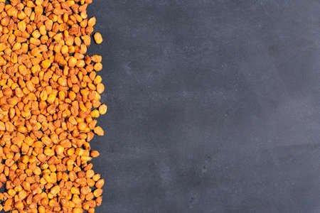 Toasted corn on the blackboard in the kitchen.の写真素材