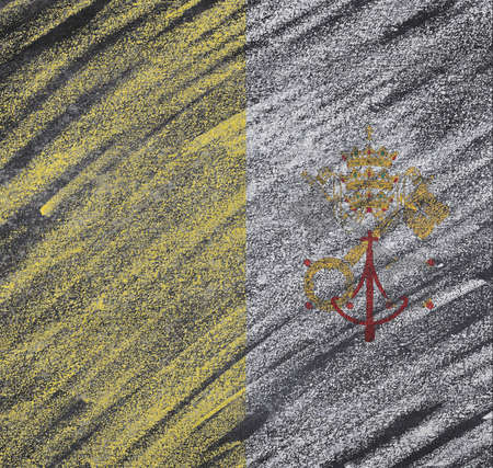 Vatican flag painted with chalk on a blackboard.の写真素材