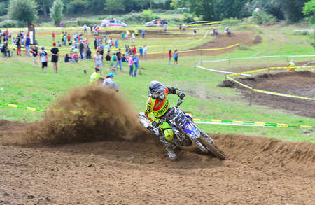 VALDESOTO, SPAIN - AUGUST 8: Asturias Motocross Championship in August 8, 2015 in Valdesoto, Spain. Marce Menendez rider with the number 15のeditorial素材