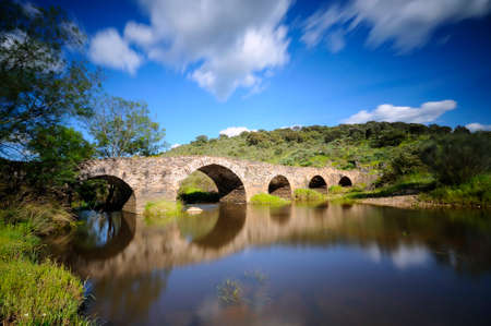 Old Bridge in Torrejon El Rubio in Caceres, Spain.の写真素材