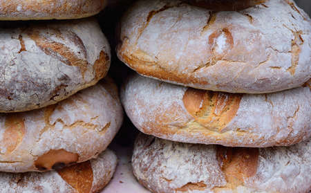 Close-up of delicious crunchy and fresh bread in basketの写真素材