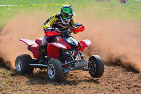 CARDO, SPAIN - SEPTEMBER 4: Unidentified racer rides a quad motorbike in the "Promotion Quad Trophy Astur" on September 4, 2016 in Cardo, Spain.のeditorial素材