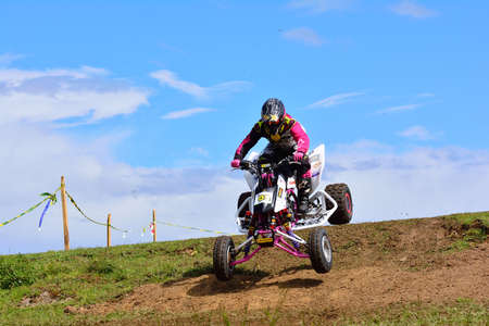 GOZON, SPAIN - MAY 13: Unidentified racer rides a quad motorbike in the "Promotion Quad Trophy Astur" on May 13, 2017 in Gozon, Spain.のeditorial素材