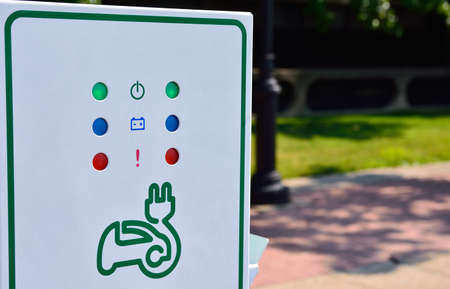 Electric car charging station on a city street.の写真素材