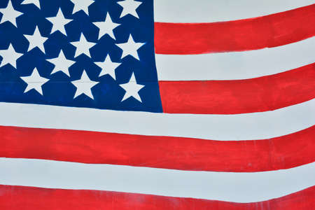 The USA flag painted on white paper with watercolorの写真素材