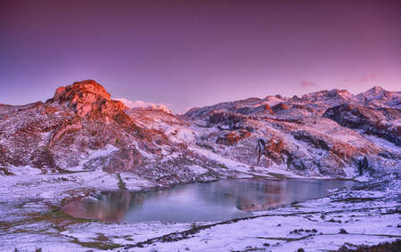 Panoramic view of Lake Ercina with snow in Asturias, Spain.の写真素材