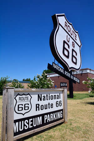 Elk City, Oklahoma - July 20, 2017: The biggest Route US 66 sign by the National Route 66 Museum in Elk City, Oklahoma. This museum complex includes the Old Town Museum which displays the history of early Oklahoma pioneer life.のeditorial素材