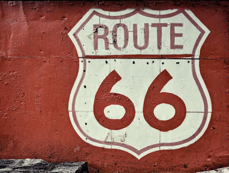 Historic U.S. old Route 66 red sign in a sheet.の写真素材