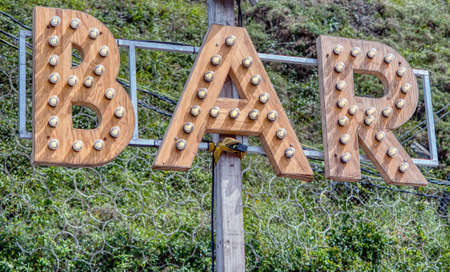 Bar luminous sign letters with bulbs light modern design の写真素材