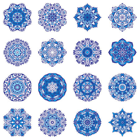 Vector Snowflakes Blue Floral Mandala ornamental set.のイラスト素材