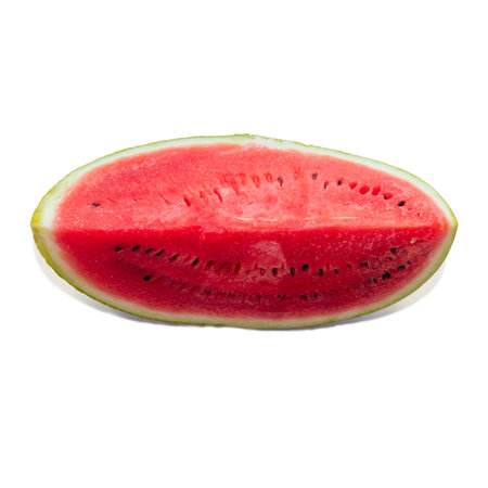 A large ripe slice of red watermelon with seeds on a white background.の写真素材