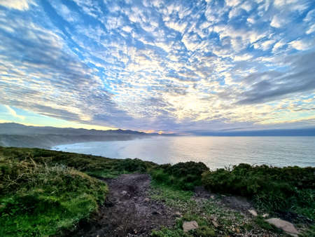 wonderful landscape of the coast with the sky full of cloudsの写真素材