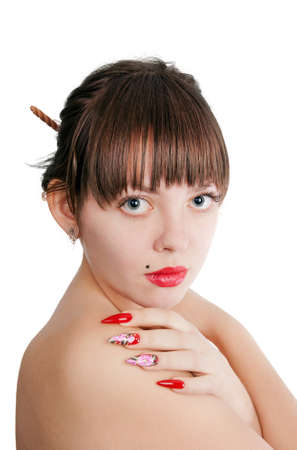 Beautiful young woman with long red nails, on the shoulder  over white backgroundの写真素材