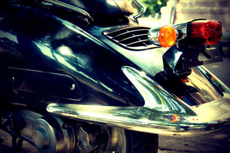 Back part of the scooter, with vintage effectの写真素材