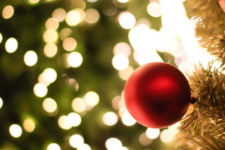 Christmas decorations and lighting on the branches christmas tree, soft focusの写真素材