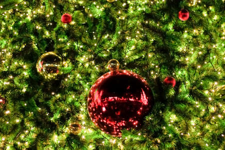 Christmas decorations and lighting on the branches christmas tree, soft focus