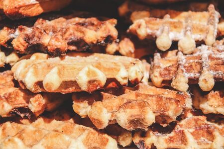 many belgian waffles with icing sugarの写真素材