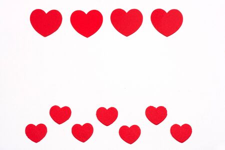 Valentine's day cut red paper heart with white background.