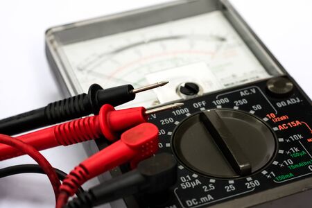 Close up Analog Multimeter isolated on white background.の写真素材