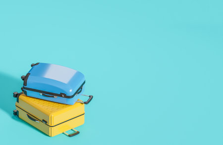 Yellow and blue suitcase on light blue background. Summer travel concept.,3d model and illustration.の写真素材