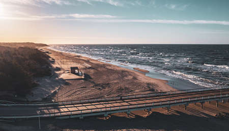 Aerial view of the sandy beach on the Baltic Sea at sunset.の写真素材