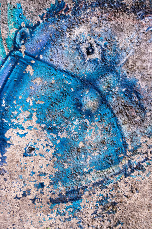 Grunge concrete wall with blue paint splashes. Abstract background.の写真素材
