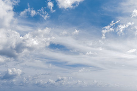blue sky background with white clouds. Beautiful fluffy clouds in the blue sky.