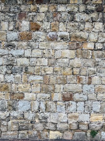 Old stone wall background. Old stone wall texture. Old stone wall backgroundの写真素材