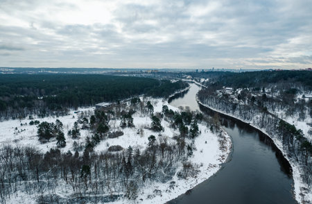 Aerial view of the river and the forest in winter. Beautiful winter landscape.の写真素材