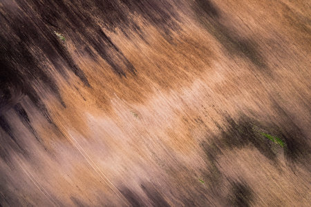Aerial view of a texture of a farm field in the countryside in summer.の写真素材