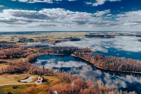Aerial view of lake and forest. Beautiful autumn landscape with lake.の写真素材