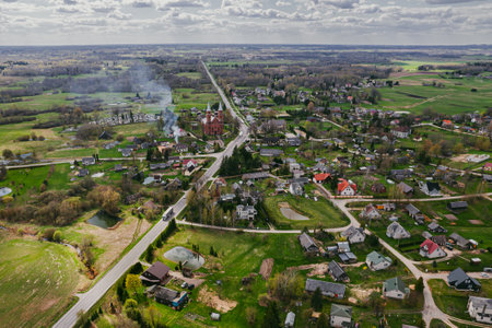 Aerial view of a small village in Lithuania with a lot of smokeの写真素材