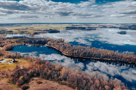 Aerial view of the lake and forest. Beautiful autumn landscape.の写真素材