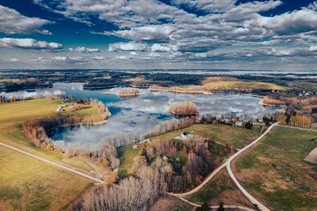 Aerial view of lake and forest. Beautiful spring landscape in Lithuaniaの写真素材