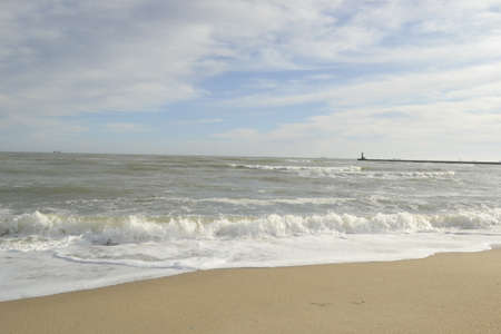 Beach and lighthouse on the Baltic Sea in Gdansk, Poland