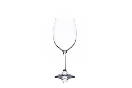 One clean empty wine glass isolated on white backgroundの写真素材