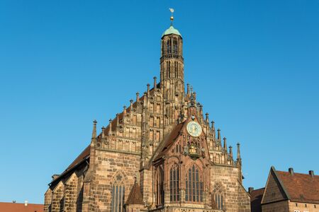 The church "Frauenkirche" on the central market in the old town of Nuremberg with blue skyのeditorial素材