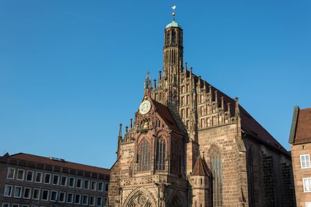 The church "Frauenkirche" on the central market in the old town of Nuremberg with blue skyのeditorial素材