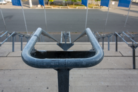 Stone stairs with metal handrails as seen from above close upの写真素材
