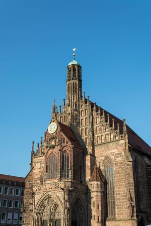The church "Frauenkirche" on the central market in the old town of Nuremberg with blue skyのeditorial素材