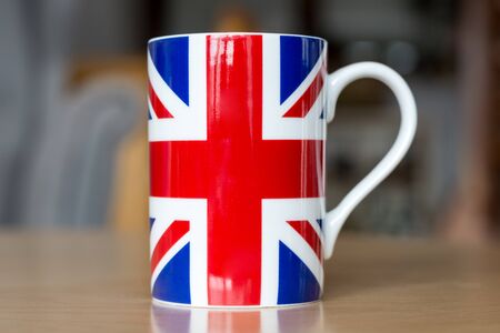 A Great Britain flag on a mug close up with blurry backgroundの写真素材