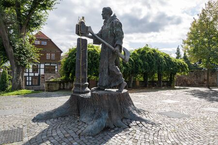 The statue of Boniface near the cathedral of the small German town Fritzlar from the sideの写真素材