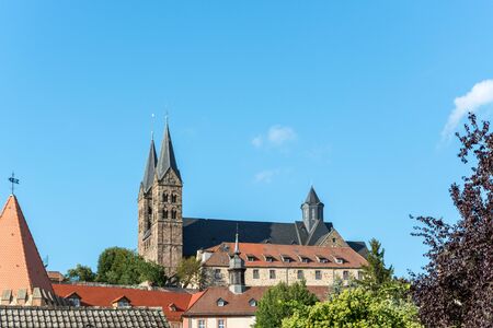The cathedral of the small German town Fritzlar with blue skyのeditorial素材